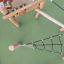 Etna wooden playground climber with rope net bridge and sturdy posts.