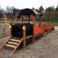 a playground locomotive made of larch wood and hdpe