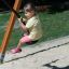 Child playing on Medium Cableway with platform at playground