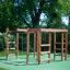 wooden climbing frame with monkey bars