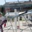 Small Powerclimber climbing net on playground with children climbing