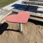 Heart Table in a sandbox in a playground.