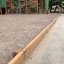 Larch Board Section Low bordering a playground