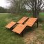 Saint-Tropez Deck Chair in a grassy outdoor setting.