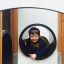 Child playing in the tunnel of the Theseus playground equipment