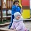 toddlers playing in the sandpit