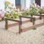Wooden Balance obstacle course for children in a sandbox.