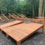 Outdoor Sit-ups Bench in a park setting.