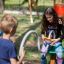 Children playing with Rings playground equipment.
