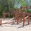 Sonora wooden playhouse in a playground setting.