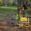 Outdoor playground set for children in Alice's house.