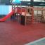 Playground with Rubber Tiles 35 flooring and play structure.