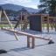 wooden seesaw with rubber tyres for shock absorption