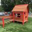 red wooden playhouse