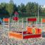 Children's play structure Jupiter on a sandy playground.