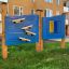 Bingo Board outdoor play equipment on a residential lawn