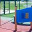 Bingo Board for playground with colorful beads on red rubber flooring