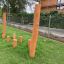 Trim Trail Nature III outdoor wooden climbing and balance structure in a park