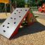 Wooden Tent playhouse with climbing wall on playground