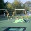 Square trampoline (150 cm) installed in an outdoor playground area.