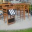 Playground equipment Wetpour 45 with slides and climbing frames in a residential area.