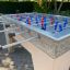 Outdoor Football Table Game with red and blue player figures.
