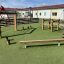 Outdoor Obstacle course for children on artificial turf playground