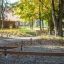 Outdoor Trim Trail playground obstacle course with balance beams.