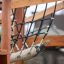 Khumbu playground climbing rope bridge with wooden frame and black nets