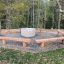 Robinia bench outdoor seating around fire pit in a forest setting