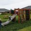 Children playing on a playground with Rubber Safety Mats.