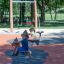 Pony Spring Rider playground equipment with children playing outdoors