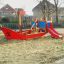 a ship sandpit for outdoor playgrounds