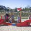 children playing in the ship sandpit