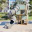 Box "Breeze" with a slide playground equipment featuring a spiral tube slide and climbing structure