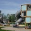 Box "Breeze" with a slide playground climbing cube in blue and wood frame