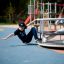 a boy playing on the merry-go-round