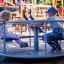 Children playing on the roundabout