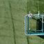 Sensory Box playground equipment with interactive panels on green grass.
