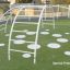 Steel Cross Climber structure on a playground.