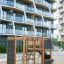 Climbing Kiosk Nature wooden playground climbing frame with ropes and chalk walls outdoors