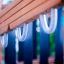 Wooden climbing frame Romping Center Nature with plastic handles.