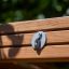 Motor Function Center Nature, wooden playhouse close-up of metal hook on wooden slats