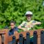 Children playing on Challenger Nature playground equipment.