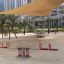 steel playground seesaw installed on the sand