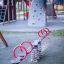 playground seesaw with red handles on the outdoor playground