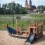 the wooden playground ship in black colours