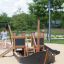 Small Ship Nature playground equipment on a sandy area