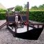 a wooden playground ship in the garden