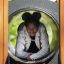 Child playing in a tunnel slide on the King-Kong Nature II castle with slide.